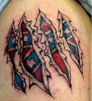 1325960166rebel-flag-shoulder-tattoo-with-skin-rip.webp
